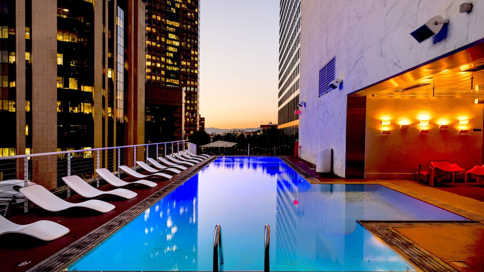 Luxury resort-style villa pool prepared for peak holiday family travel