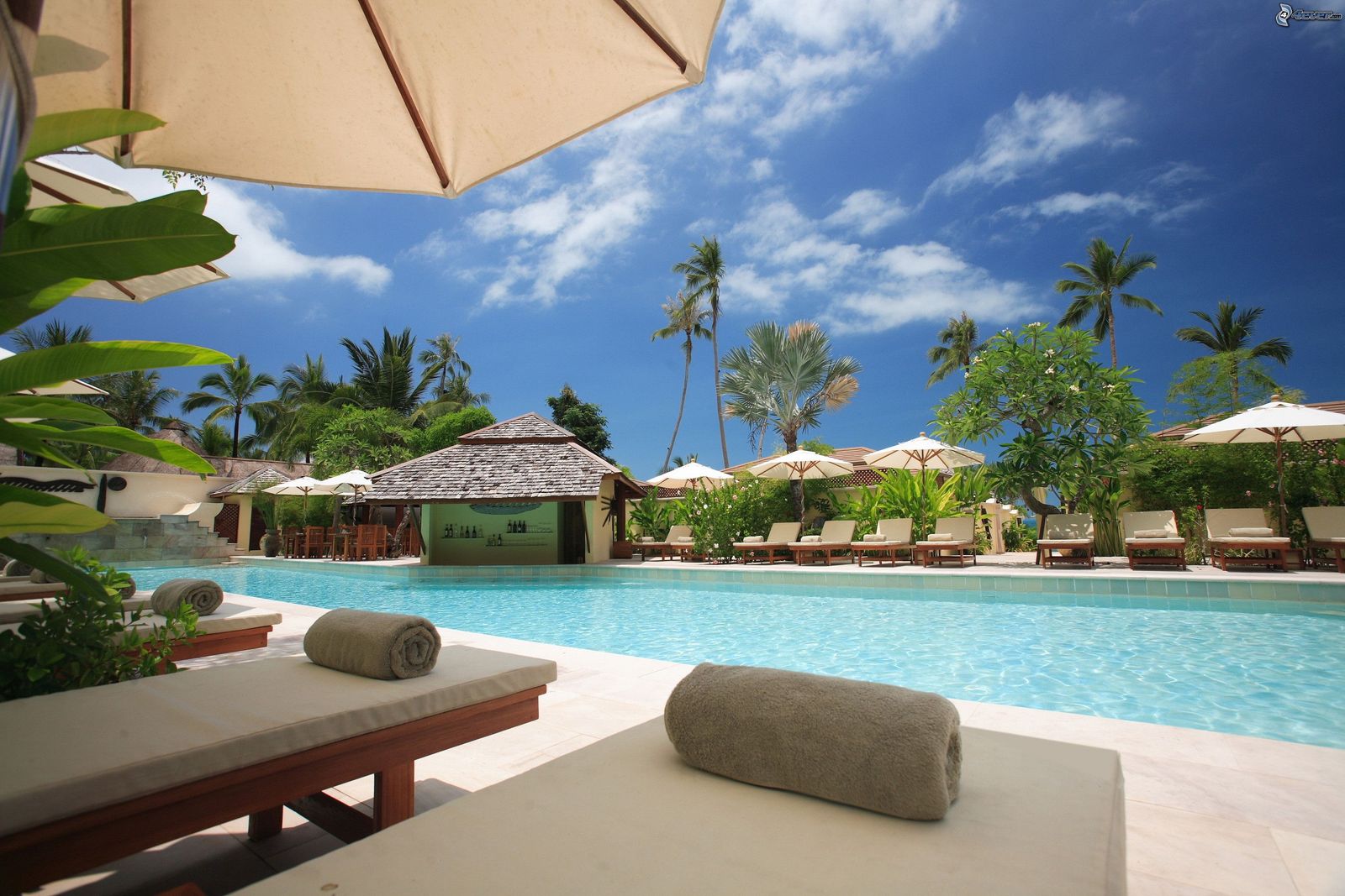 Luxury resort walkway at sunset for honeymoon planning