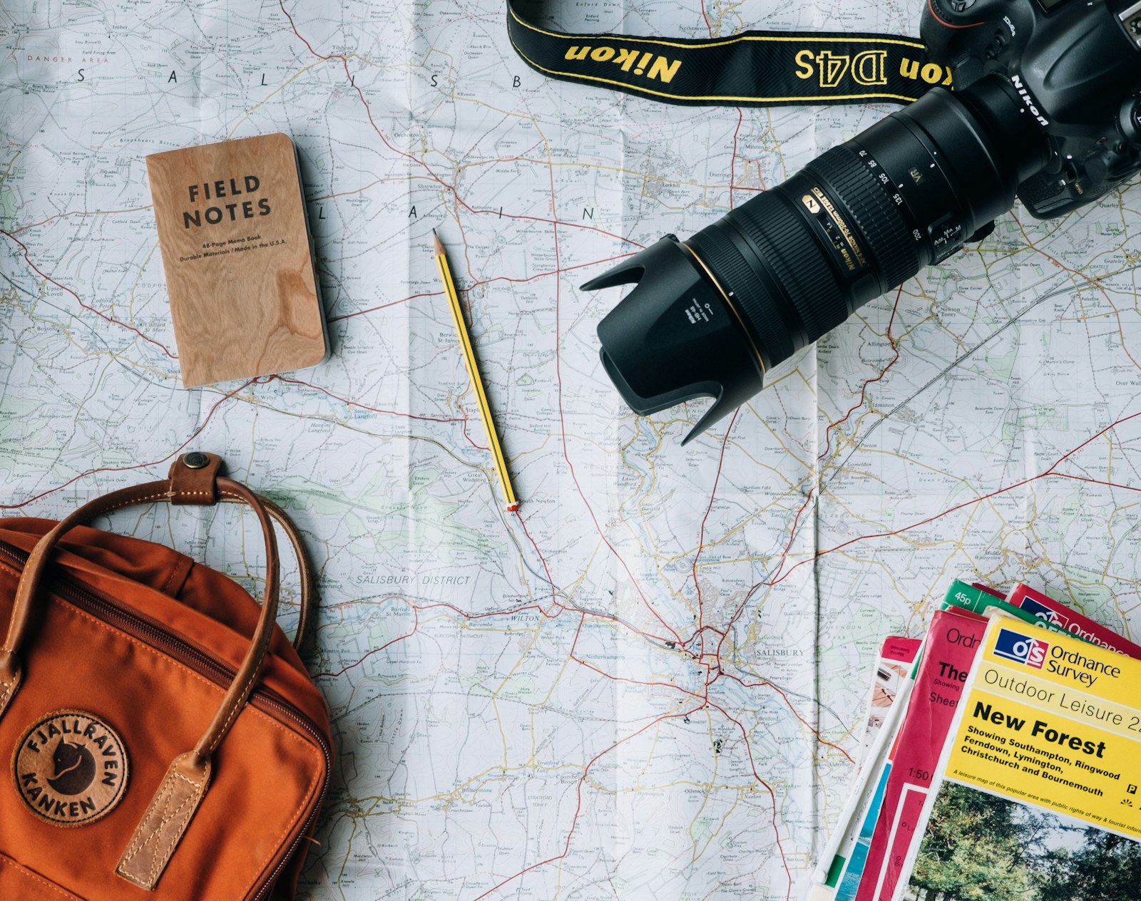 Traveler reviewing a map and notes before choosing private guides or group tours