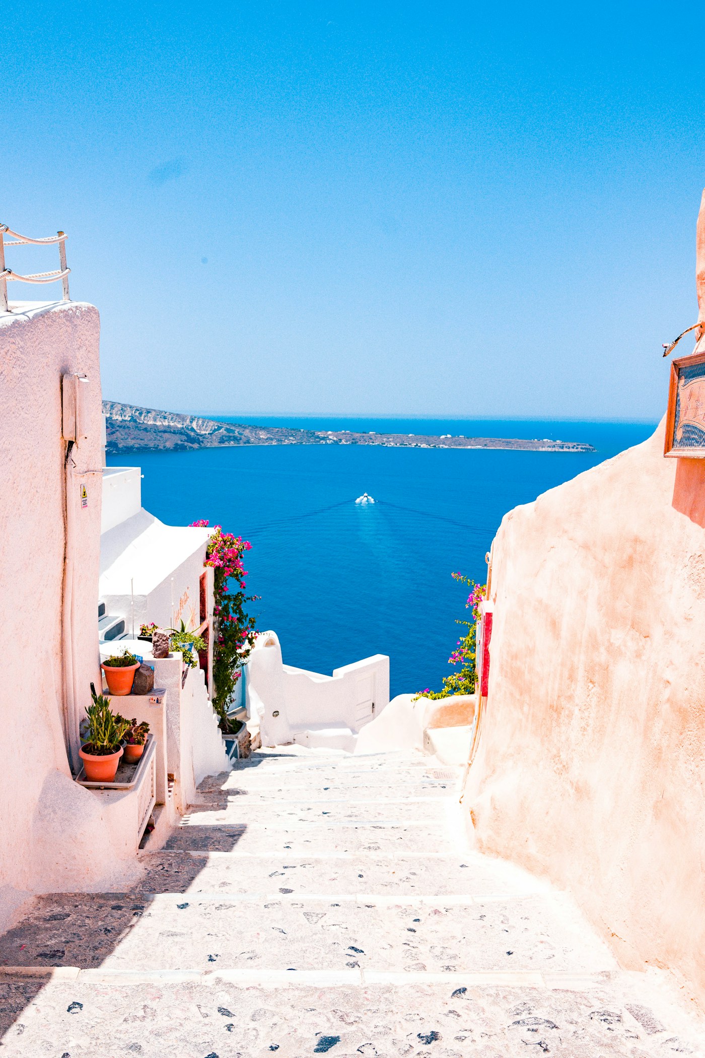 Whitewashed steps overlooking the Aegean Sea in Greece